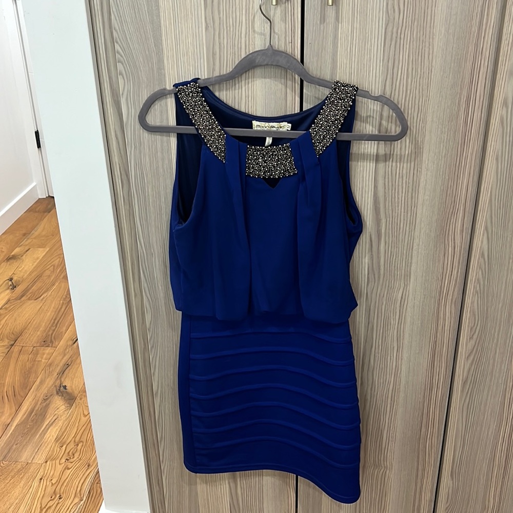 Women’s royal blue cocktail dress with neck beading